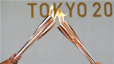 东京奥运会火炬开始在东京传递